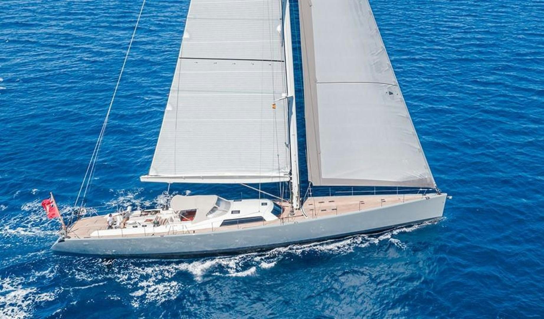 a white boat on the water aboard KENORA Yacht for Sale