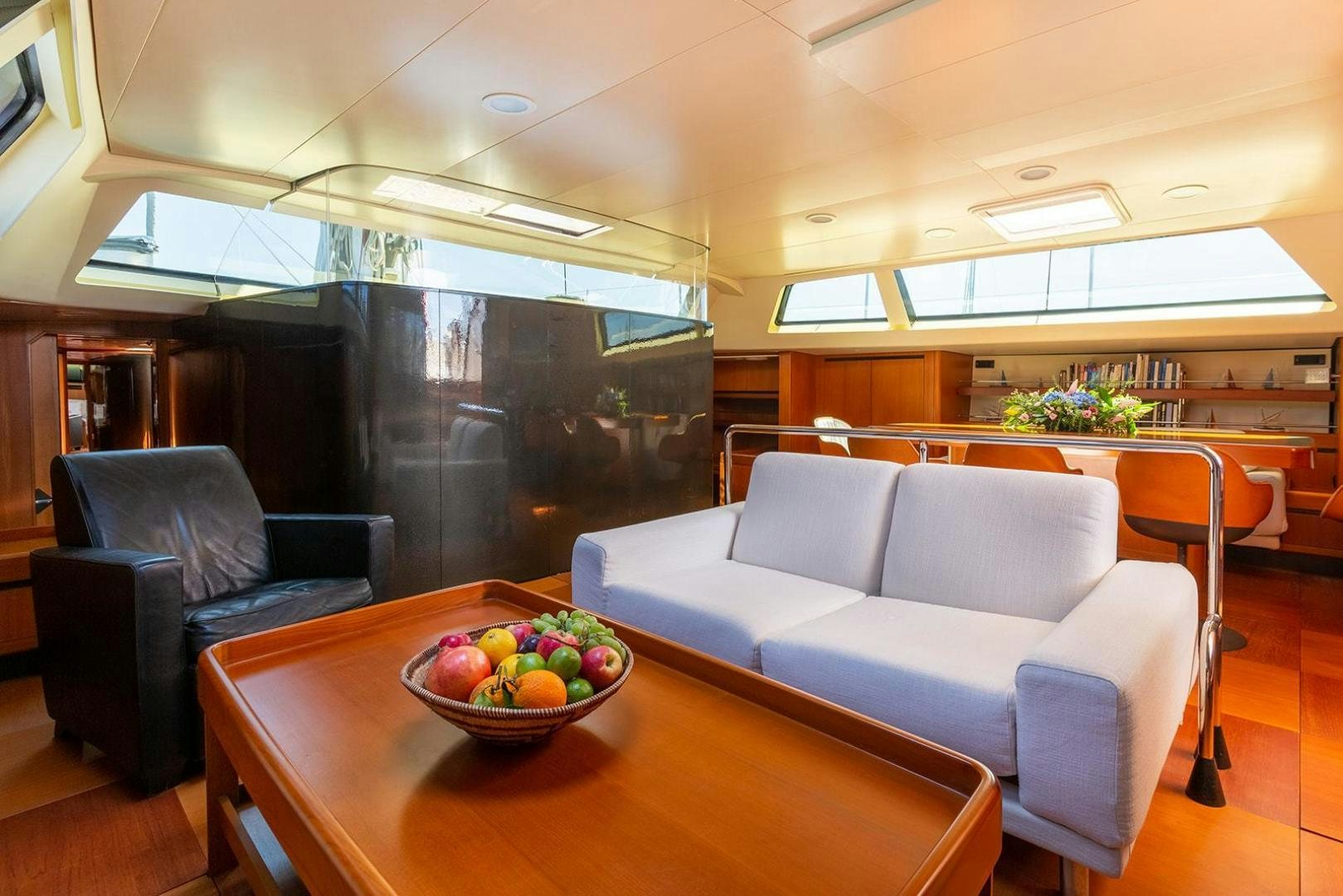 a room with couches and chairs aboard KENORA Yacht for Sale