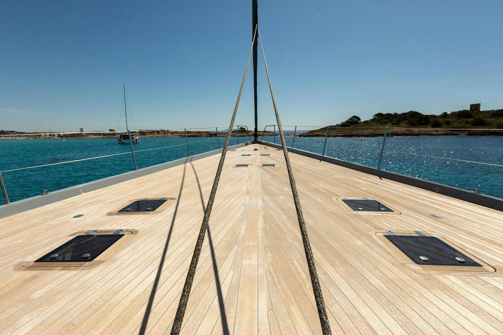 a wooden bridge over water aboard KENORA Yacht for Sale