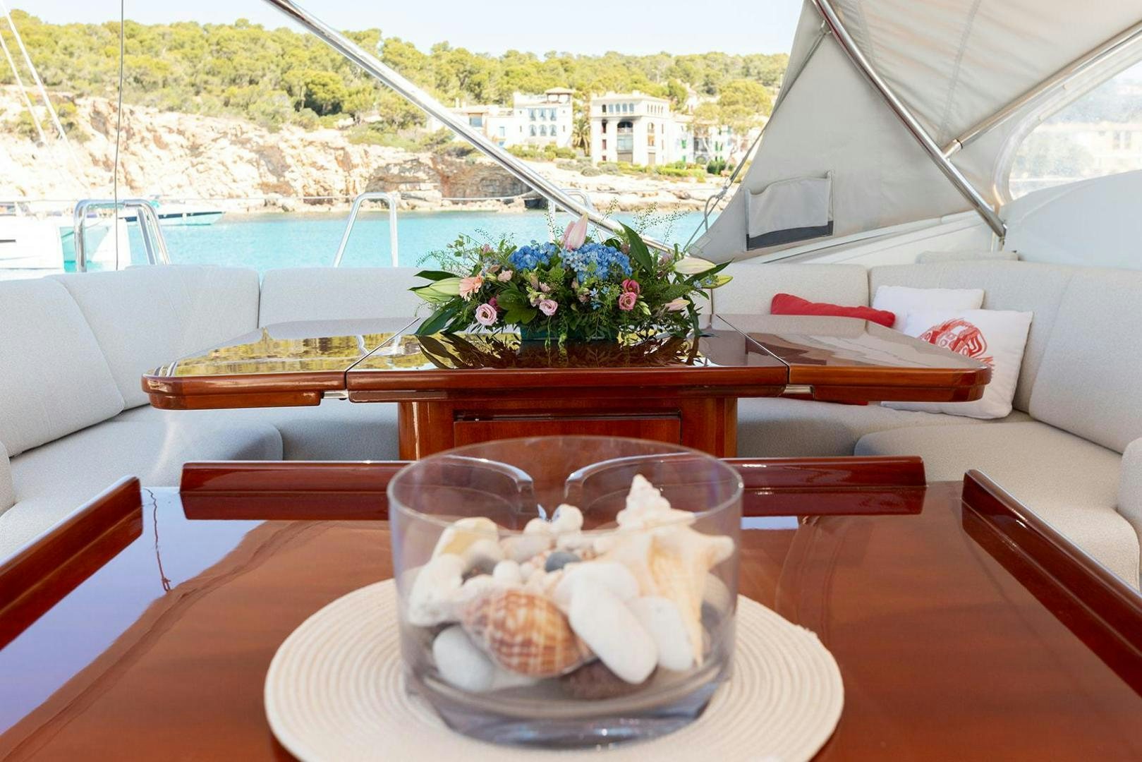 a plate of dessert on a table aboard KENORA Yacht for Sale
