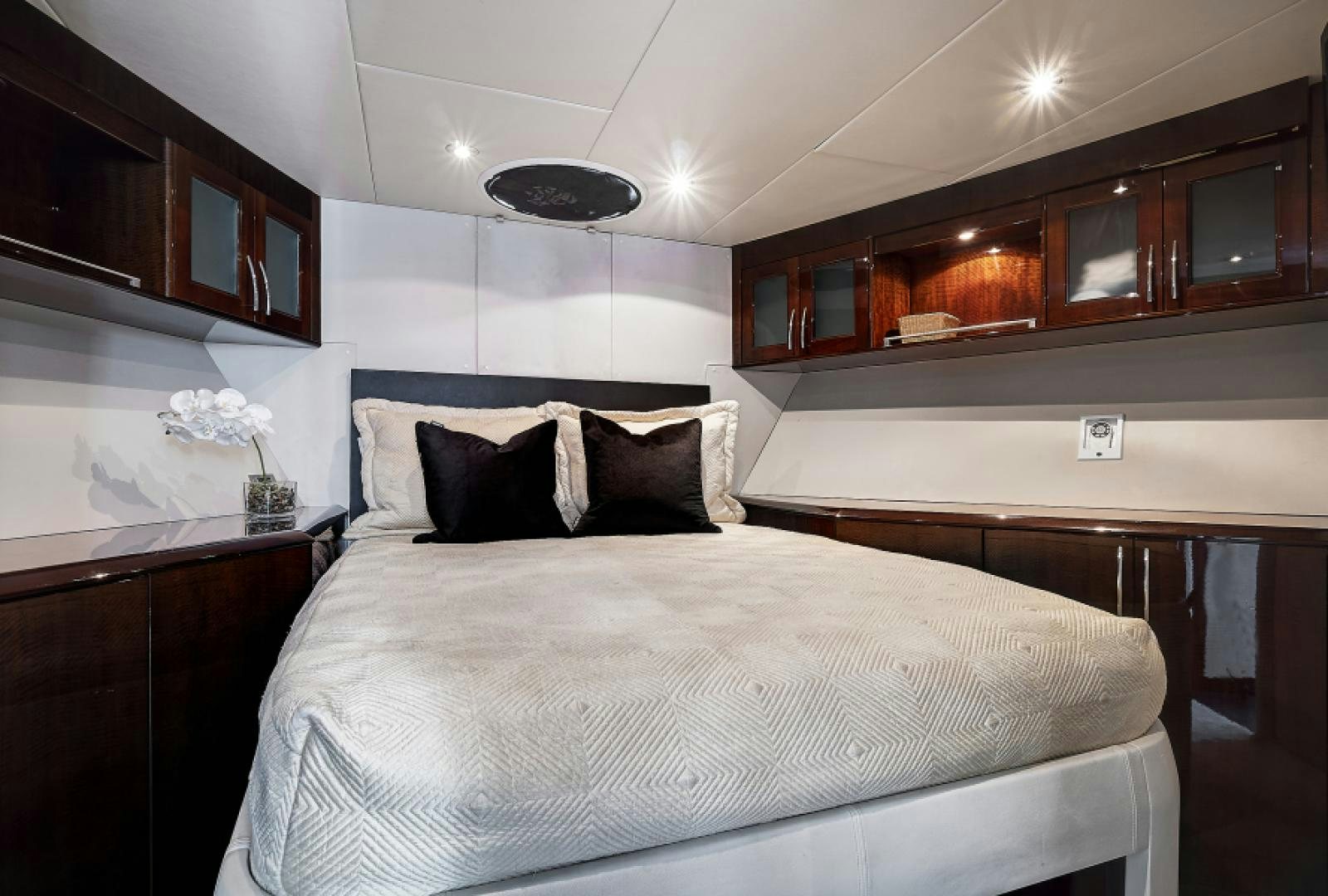 a large bedroom with a large bed aboard LADY H Yacht for Sale