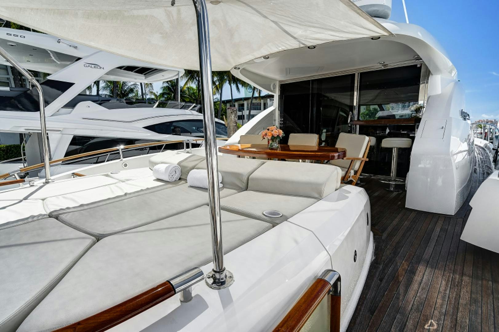 a white boat in a room aboard LADY H Yacht for Sale