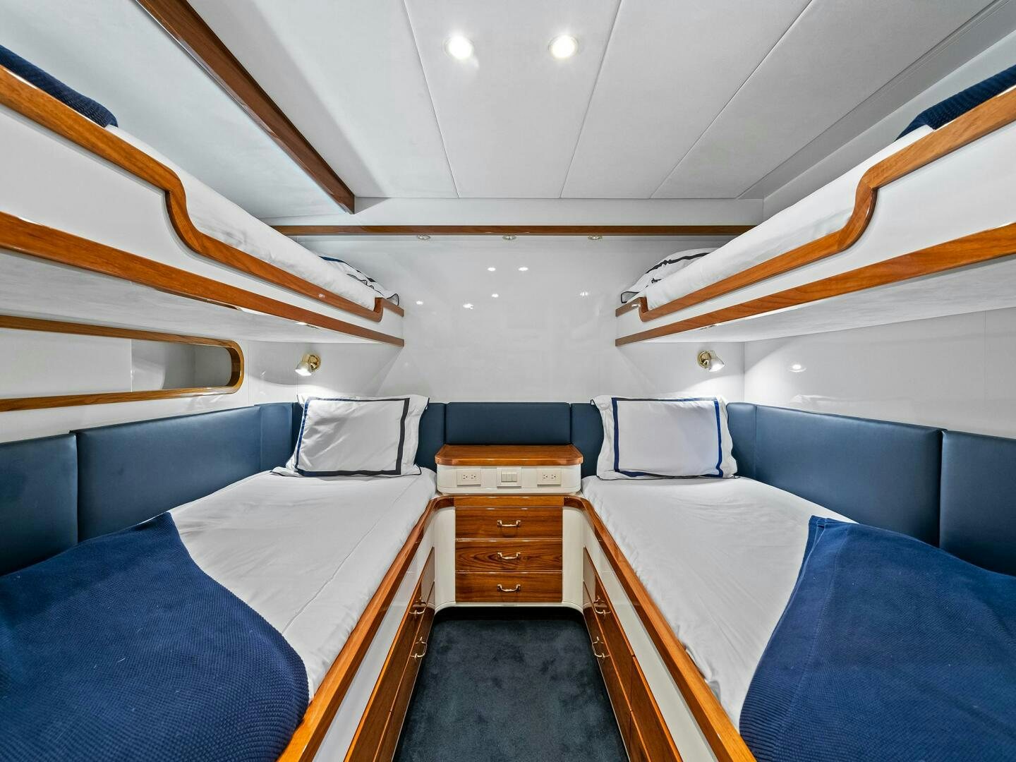 a room with a sink and cabinets aboard SIENNA Yacht for Sale