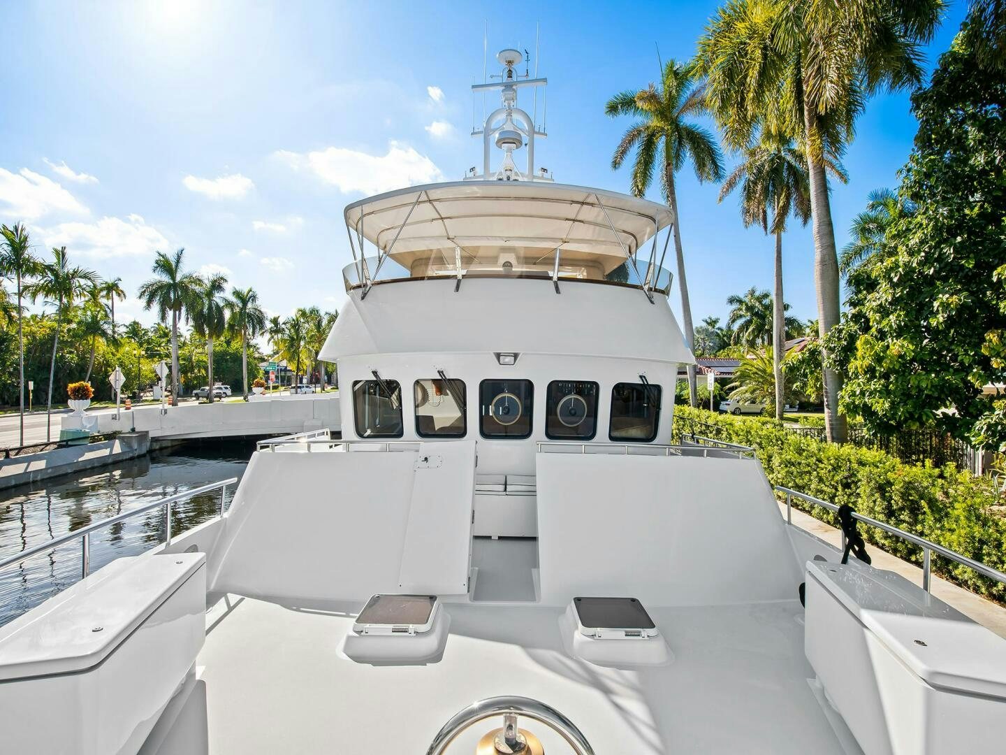a white boat with a domed roof aboard SIENNA Yacht for Sale