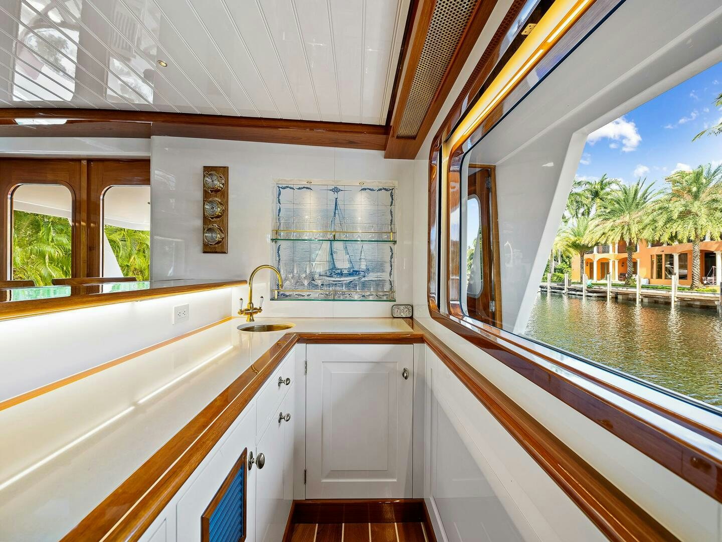 a bathroom with a large window aboard SIENNA Yacht for Sale
