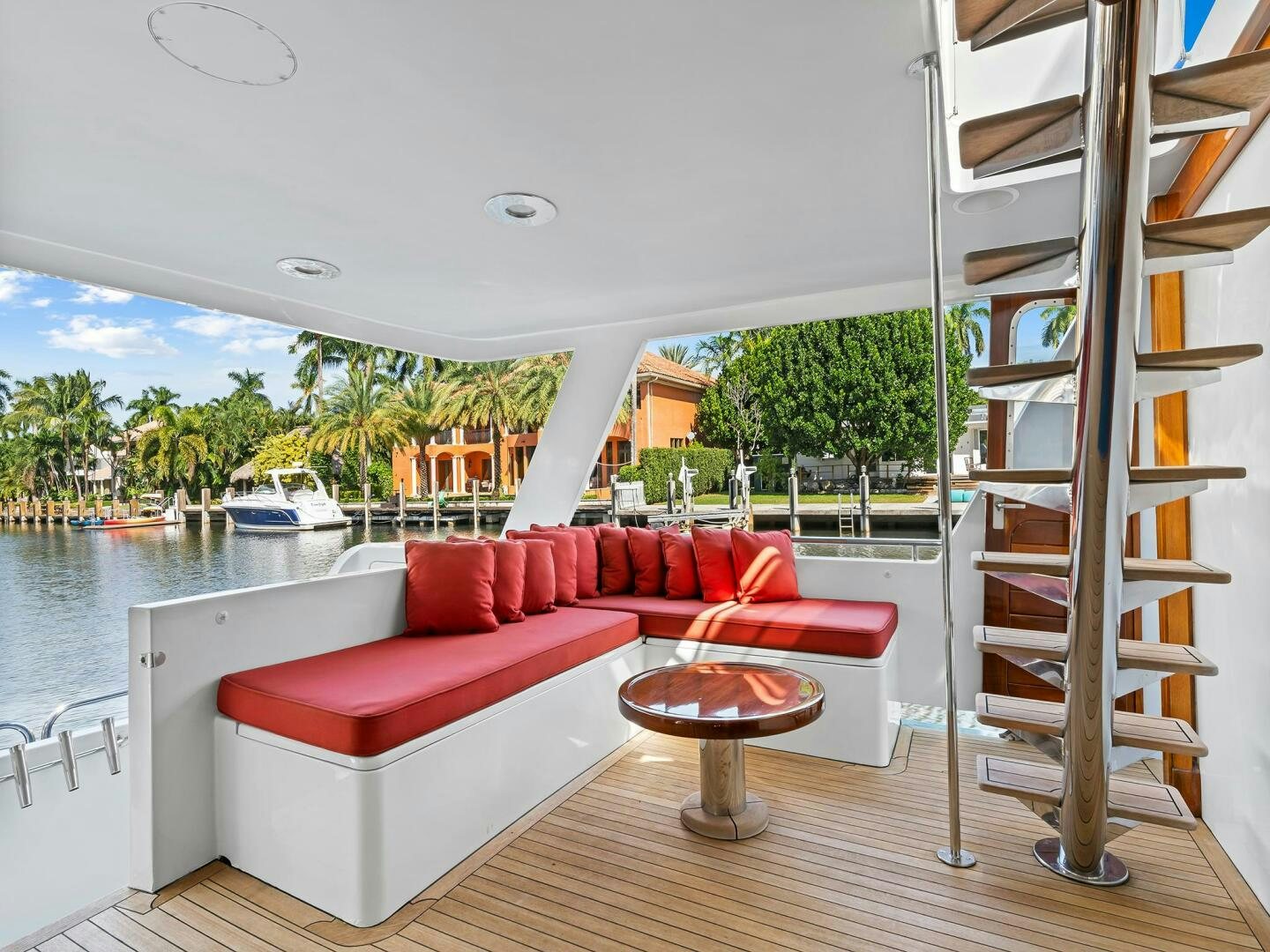 a room with a couch and a ladder aboard SIENNA Yacht for Sale