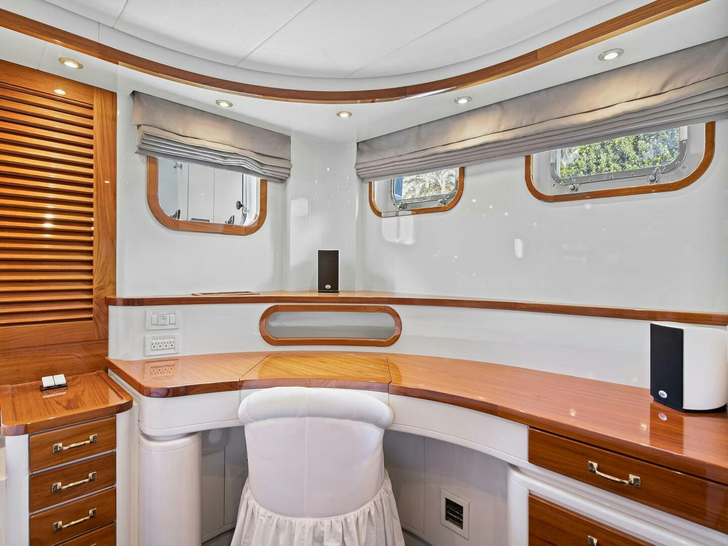 a room with a wood shelf and a stool aboard SIENNA Yacht for Sale