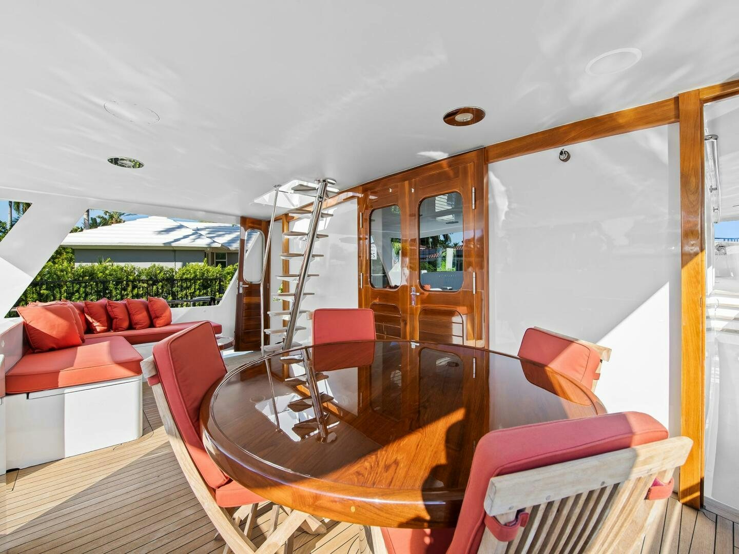 a boat with a deck and chairs aboard SIENNA Yacht for Sale