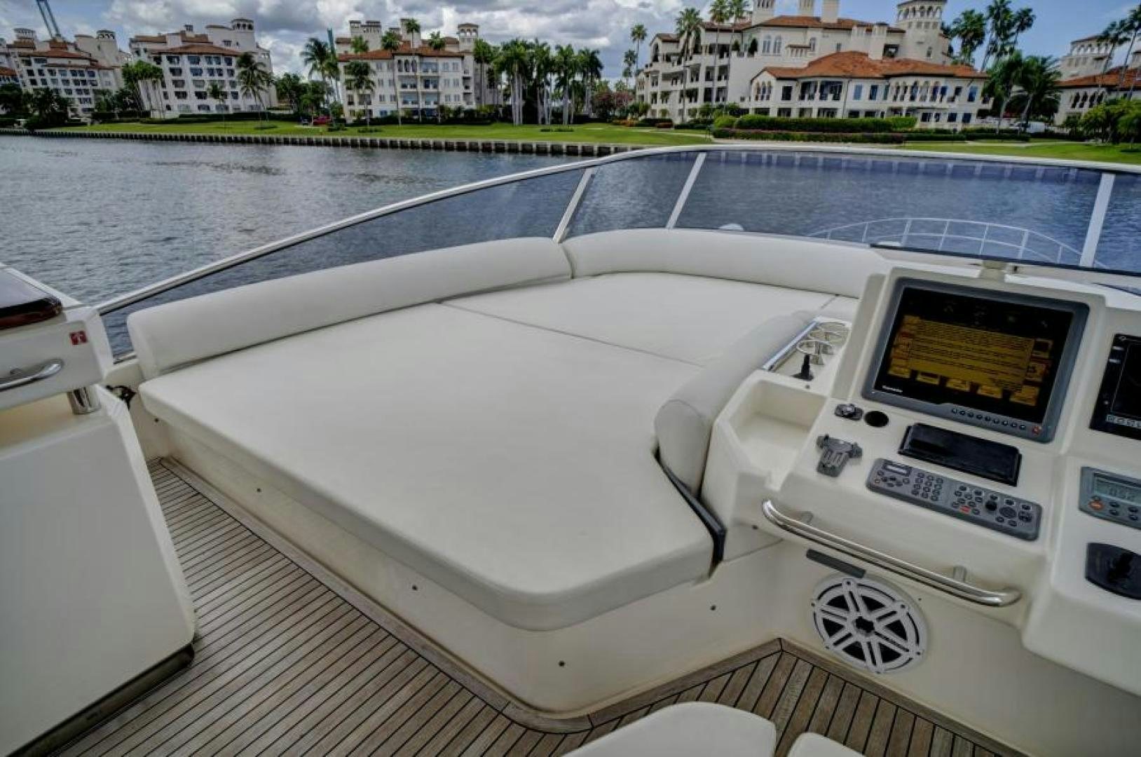 a white car on a dock aboard WICKED Yacht for Sale