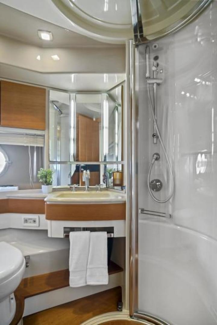 a bathroom with a sink and a shower aboard WICKED Yacht for Sale