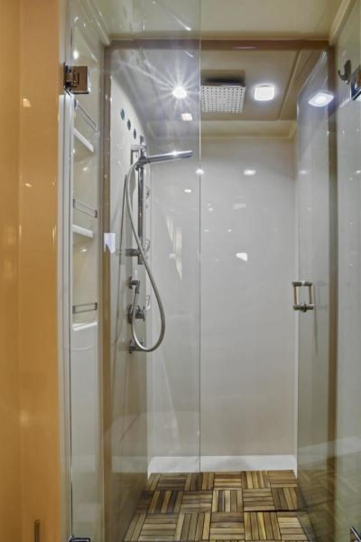 a shower unit with a glass door aboard WICKED Yacht for Sale
