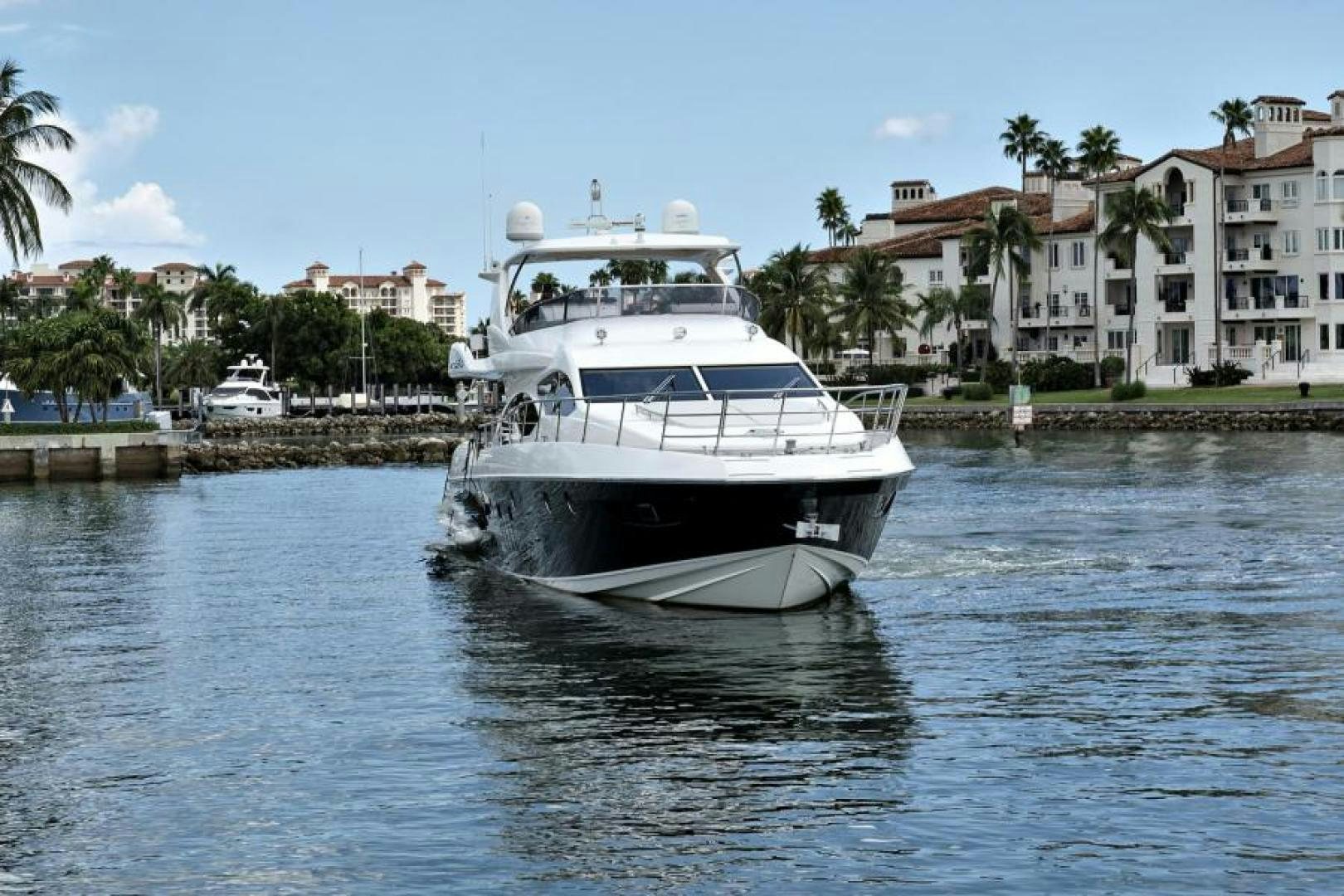 a white boat in the water aboard WICKED Yacht for Sale