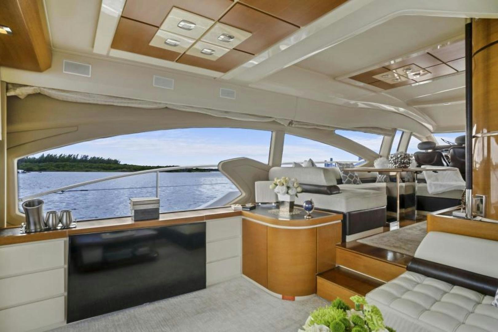 a room with a large window and a view of the water aboard WICKED Yacht for Sale