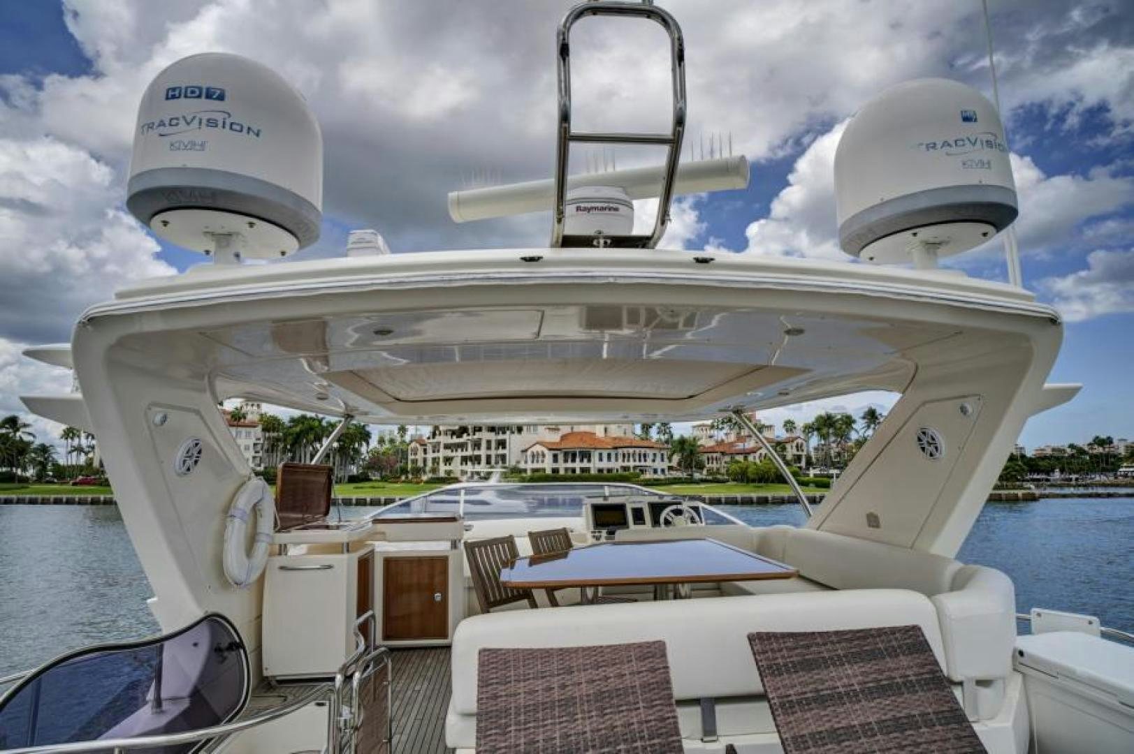 a white building with a satellite dish on top aboard WICKED Yacht for Sale
