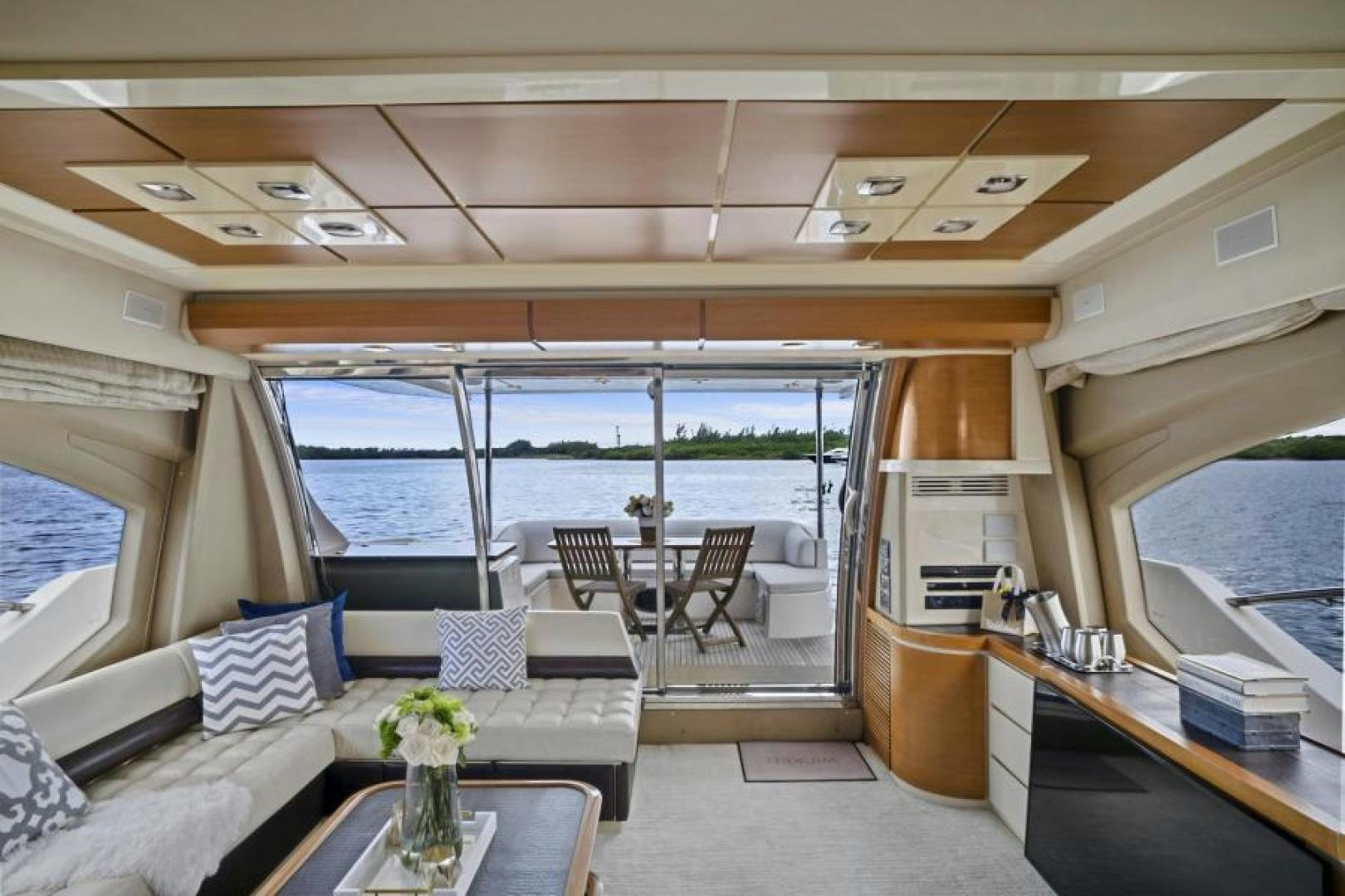 a room with a table and chairs aboard WICKED Yacht for Sale