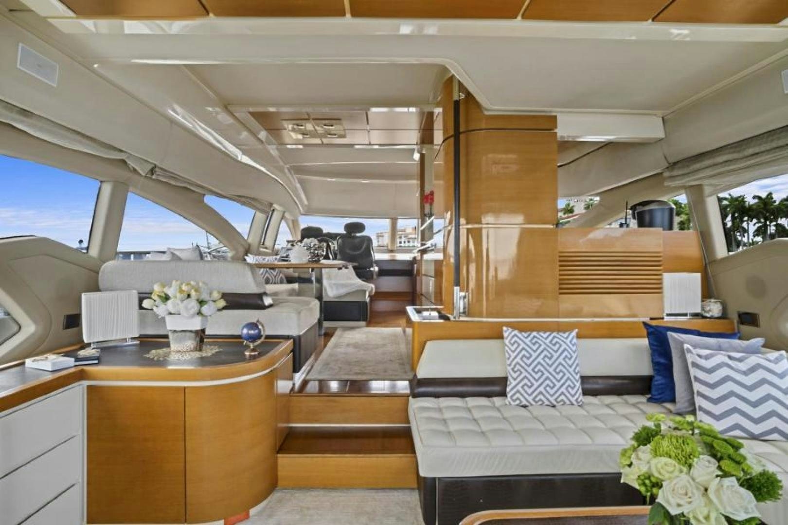 a room with a table and chairs aboard WICKED Yacht for Sale