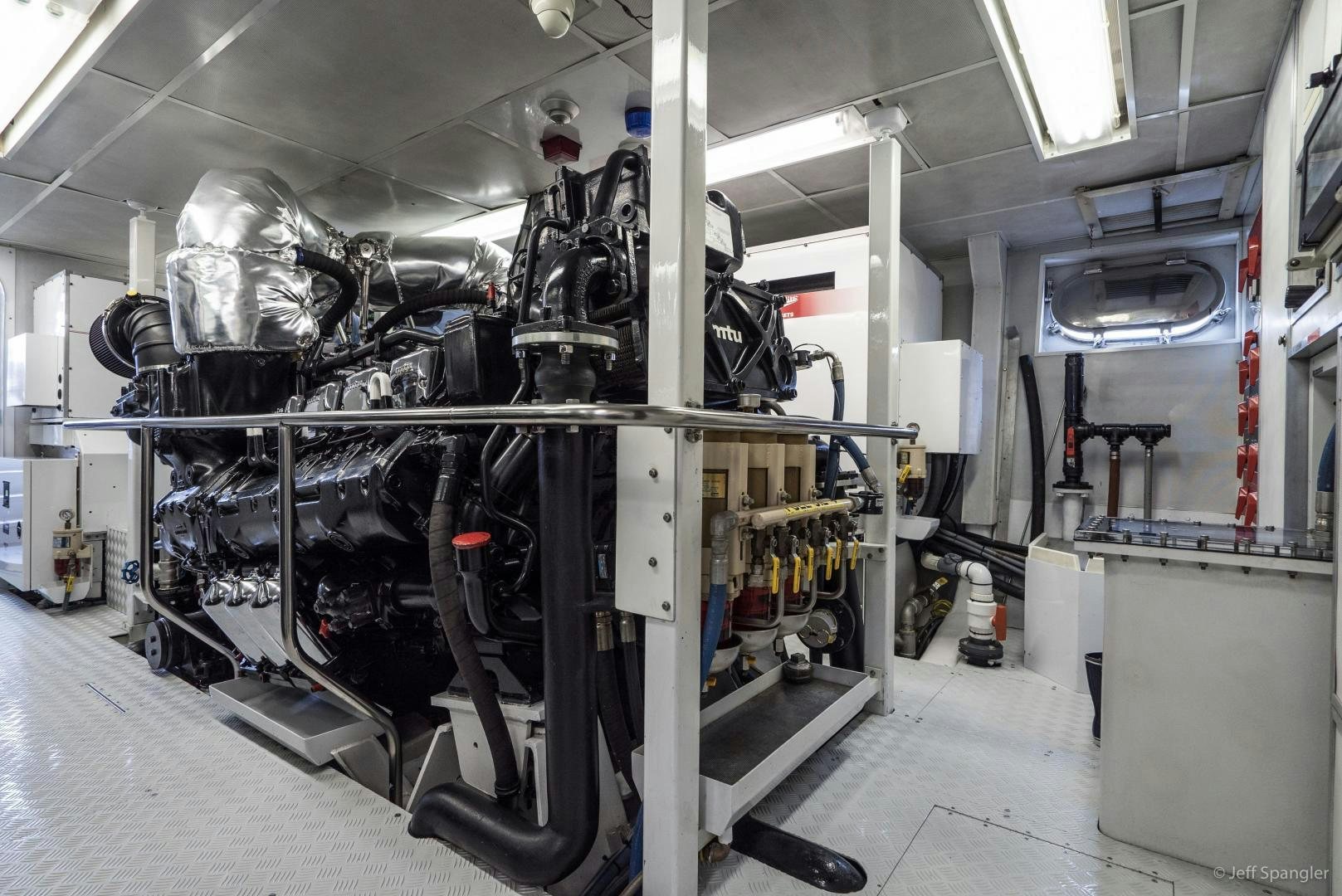 a large machine in a room aboard LIFE OF RILEY Yacht for Sale