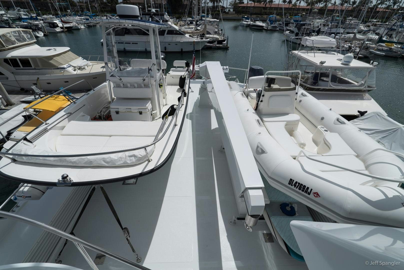 a group of boats are parked in a harbor aboard LIFE OF RILEY Yacht for Sale