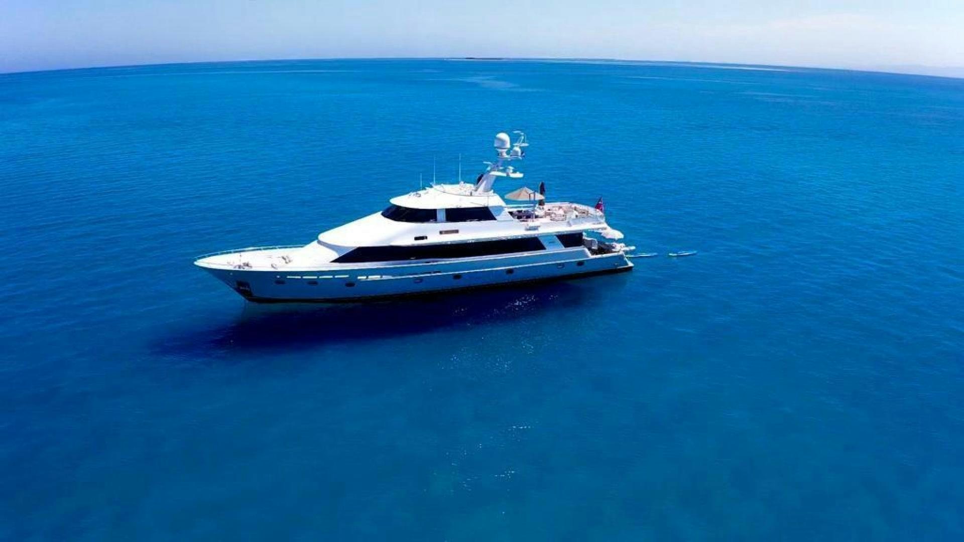 a white boat in the water aboard LIFE OF RILEY Yacht for Sale