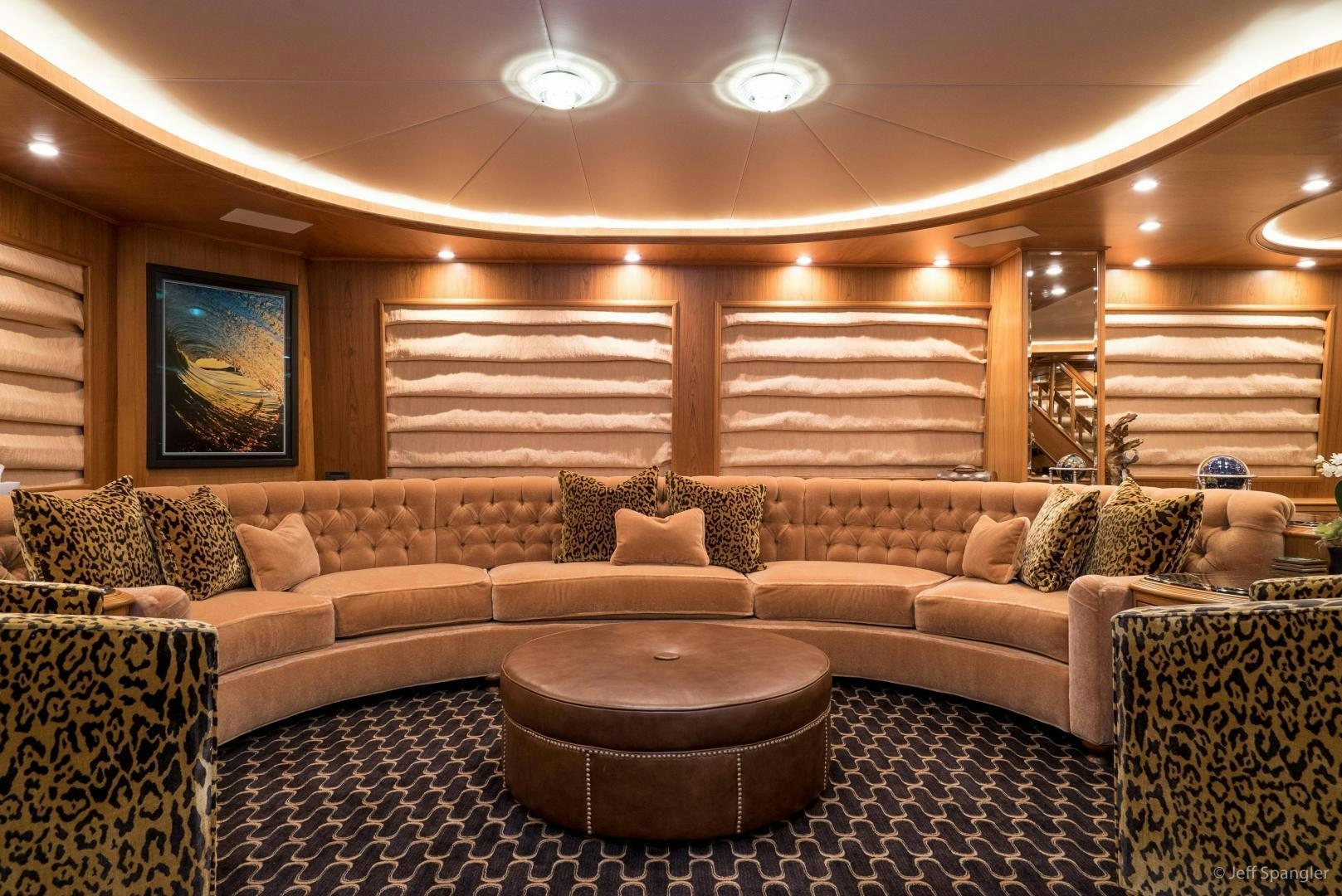 a living room with a couch and a coffee table aboard LIFE OF RILEY Yacht for Sale