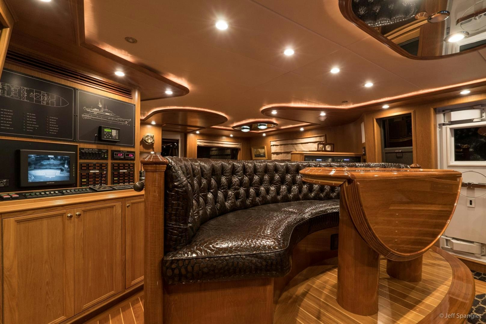 a leather couch in a room aboard LIFE OF RILEY Yacht for Sale