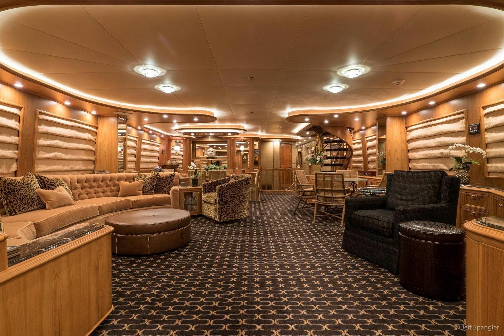 a living room with a large rug aboard LIFE OF RILEY Yacht for Sale