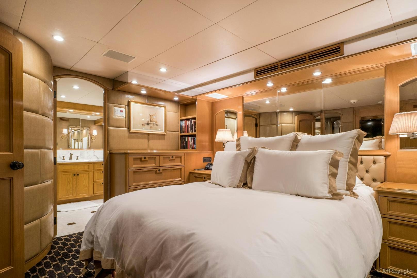 a bed in a room aboard LIFE OF RILEY Yacht for Sale