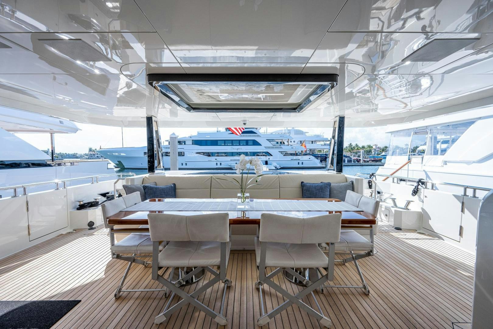 a room with a table and chairs aboard SEAMENT Yacht for Sale