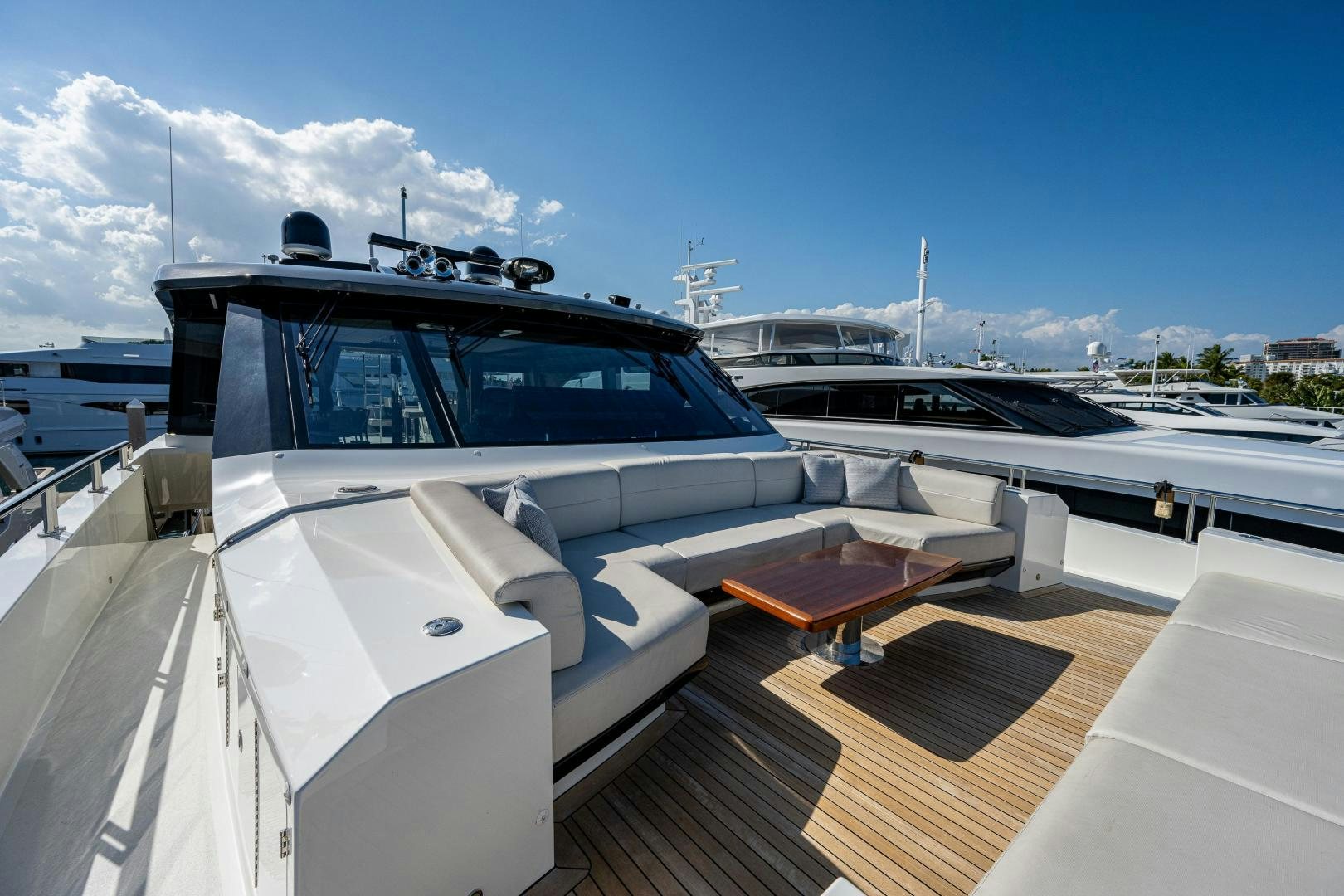 a white car with a black roof aboard SEAMENT Yacht for Sale