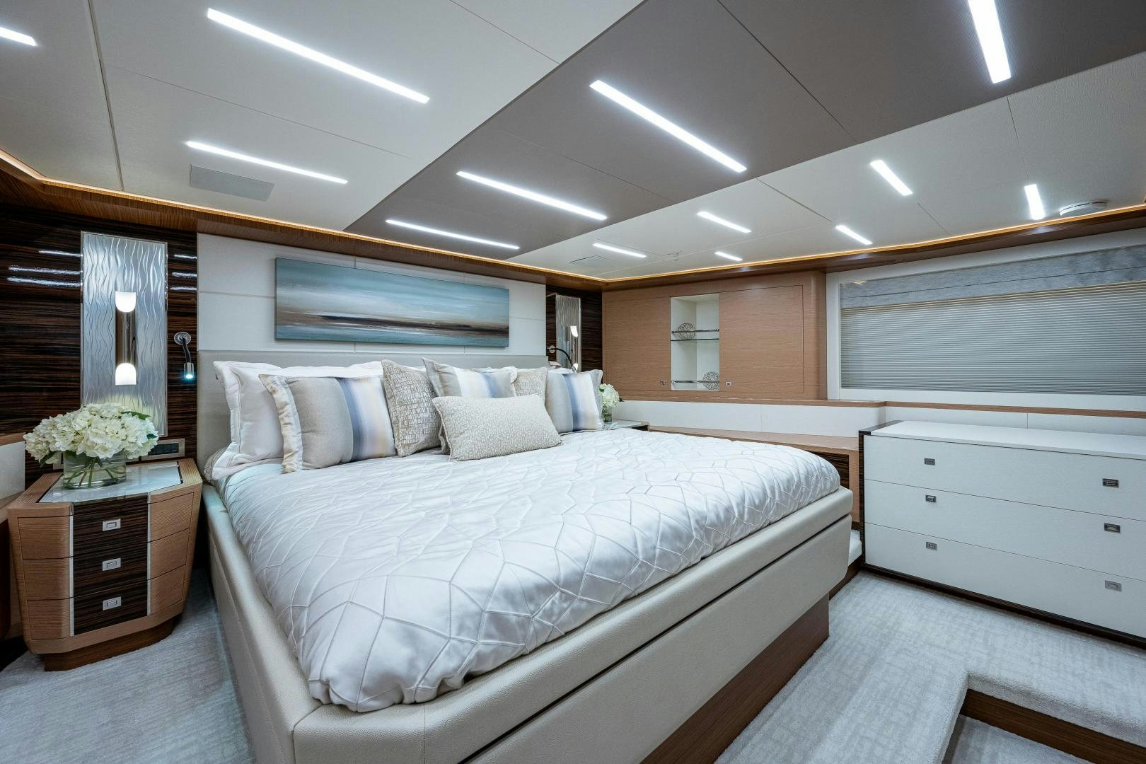 a large bedroom with a large bed aboard SEAMENT Yacht for Sale