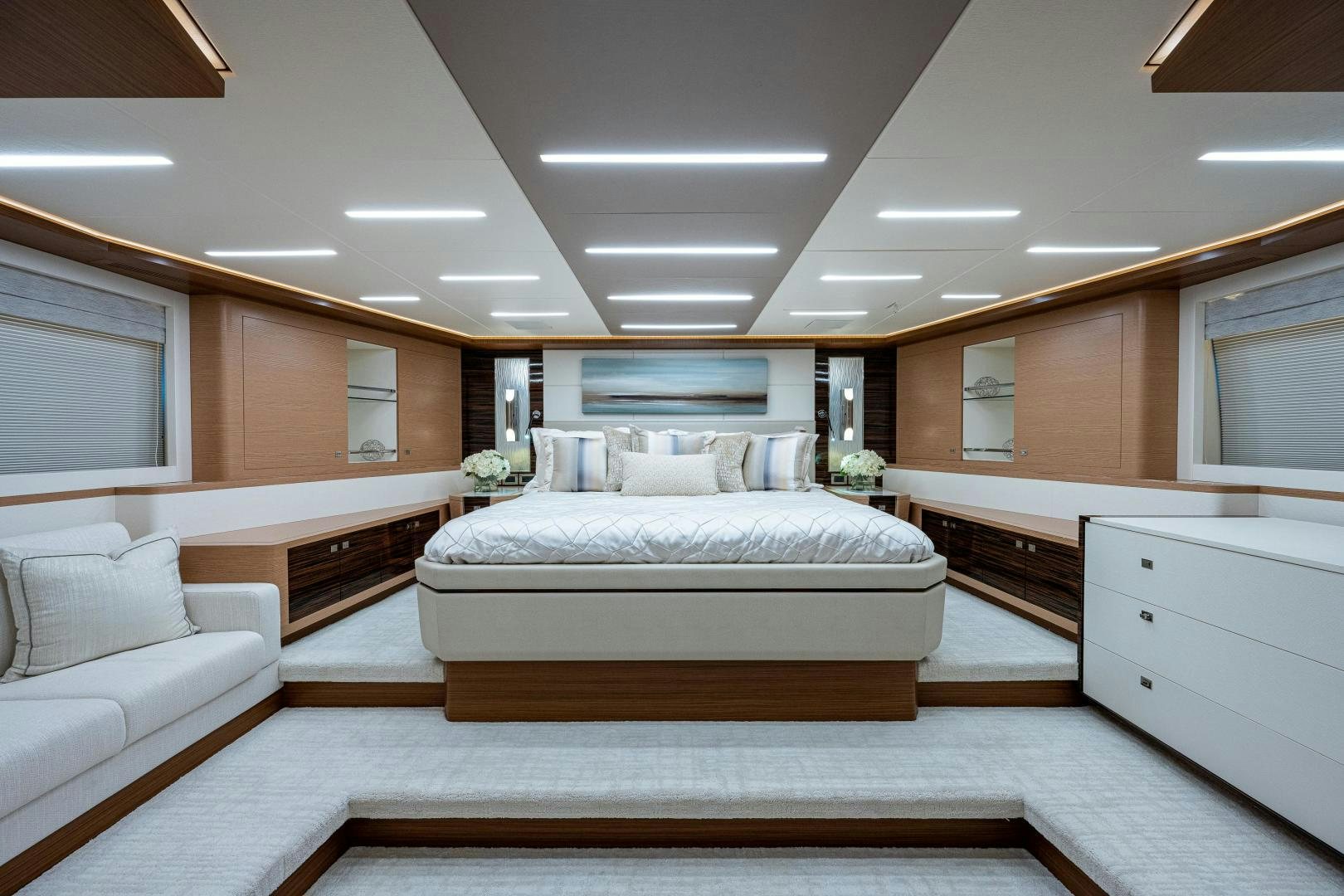 a room with a bed and a couch aboard SEAMENT Yacht for Sale