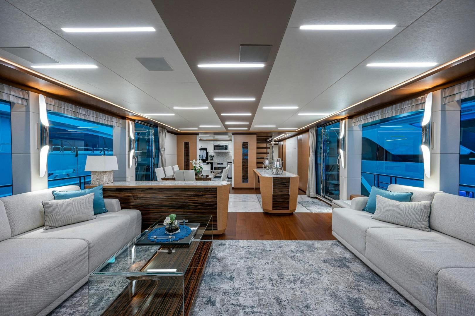 a living room with a couch and a coffee table aboard SEAMENT Yacht for Sale