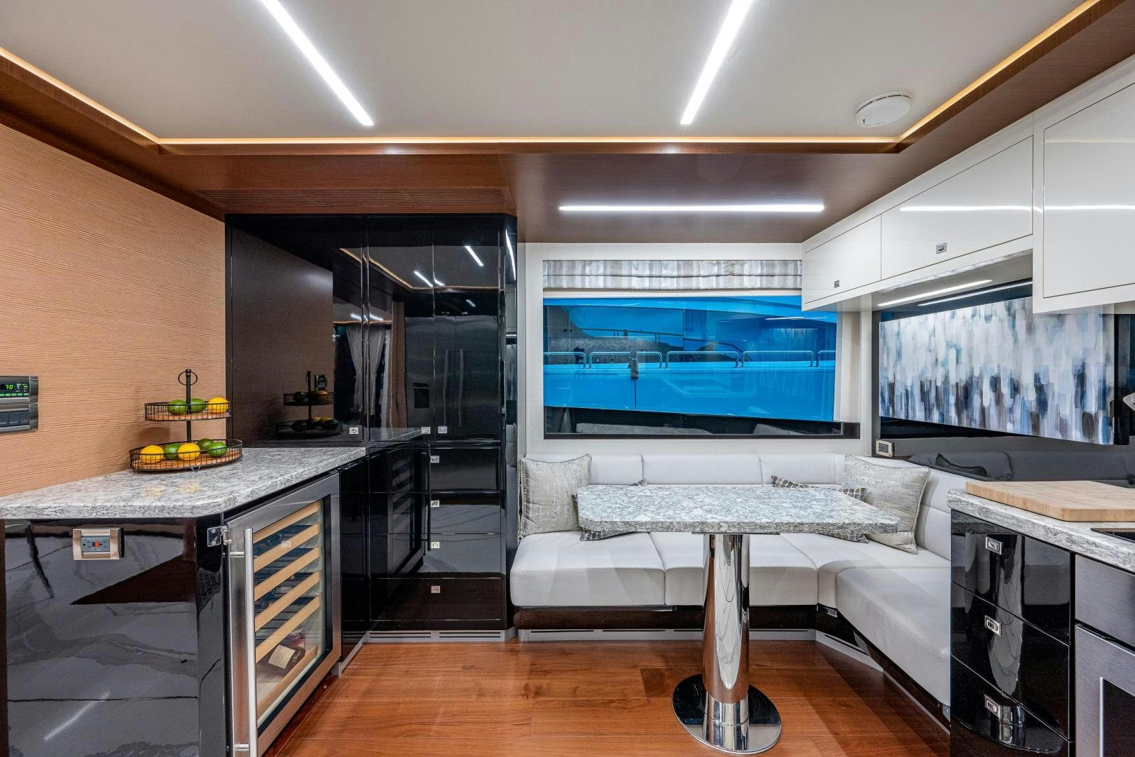 a kitchen with a large screen aboard SEAMENT Yacht for Sale
