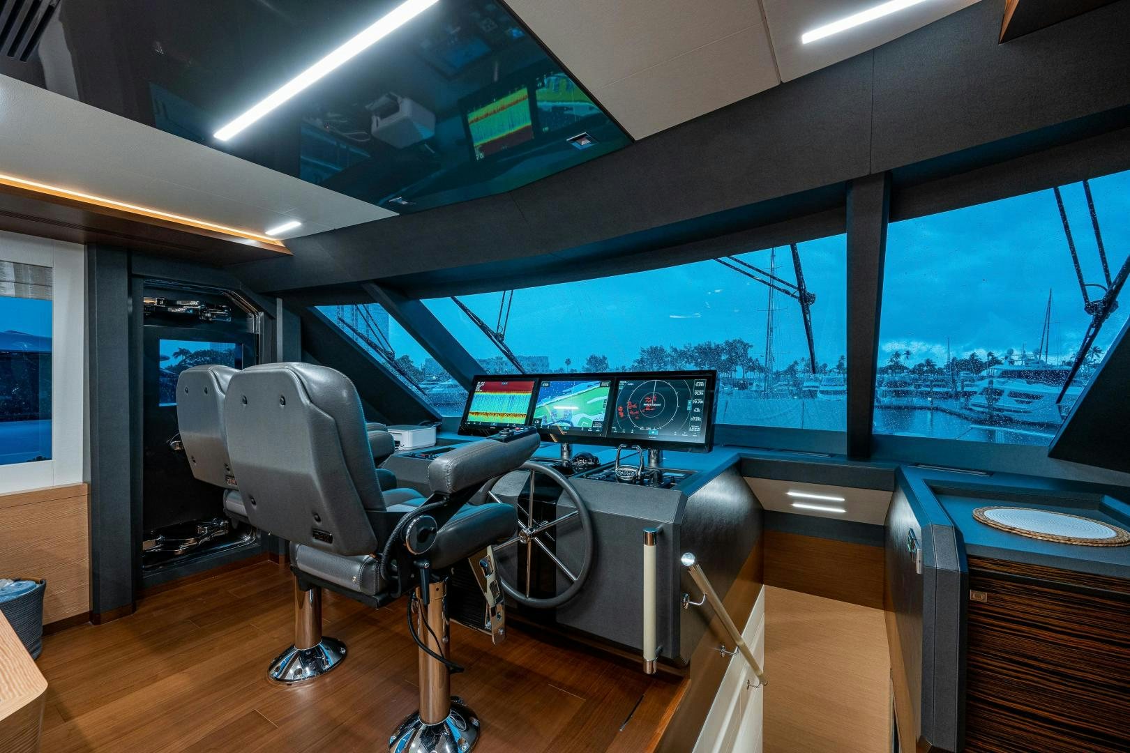 a room with a large screen aboard SEAMENT Yacht for Sale