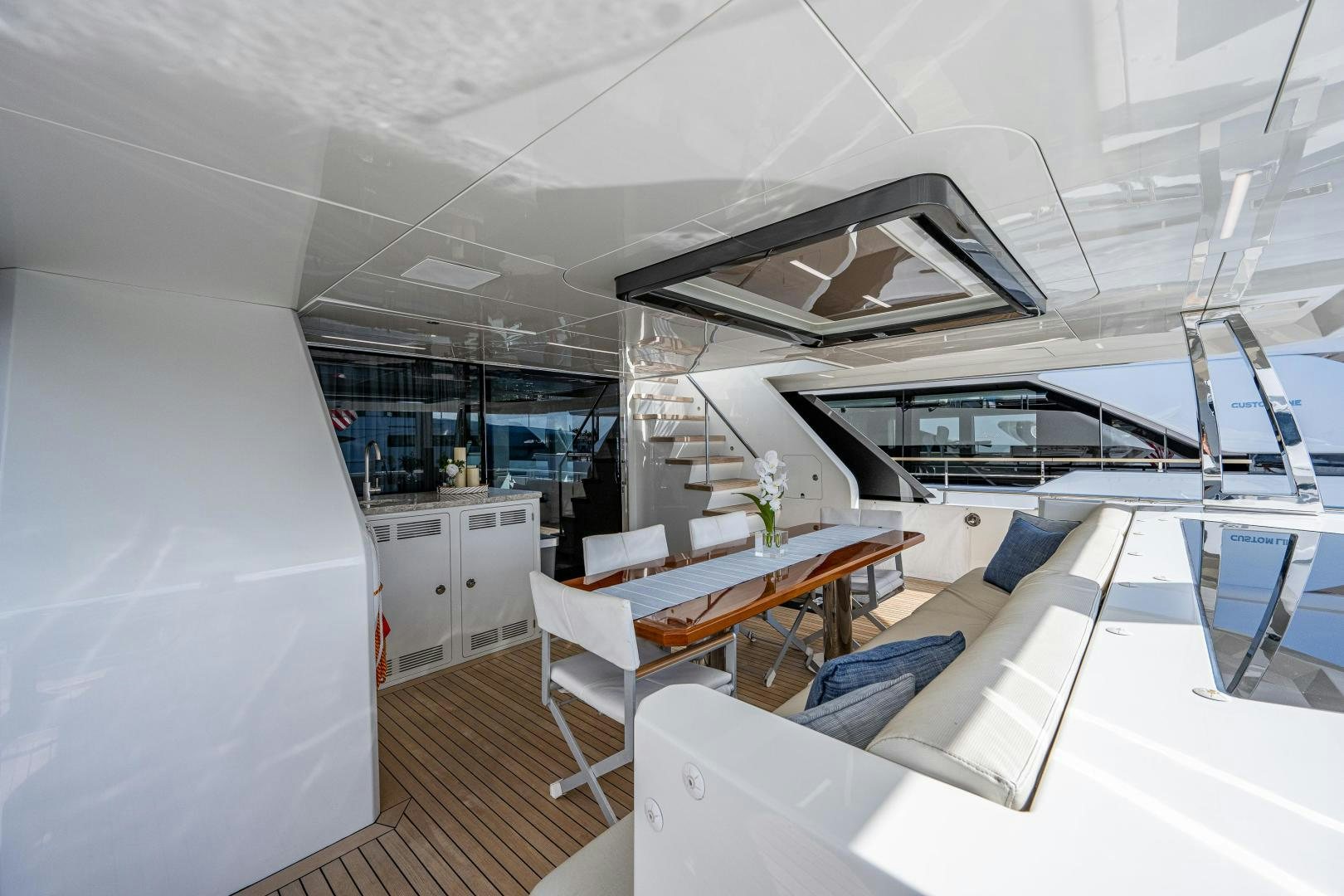 a room with a table and chairs aboard SEAMENT Yacht for Sale