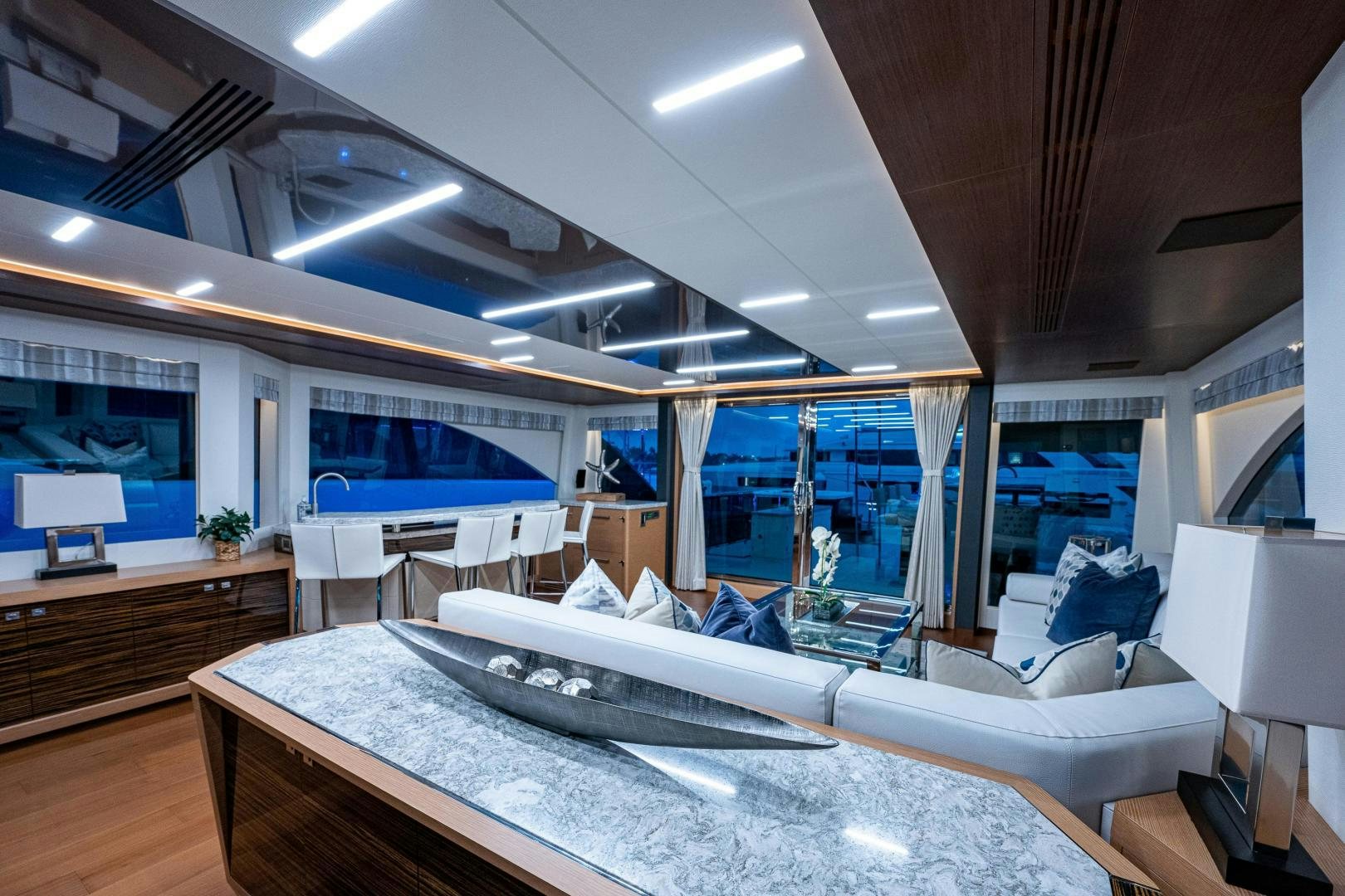 a room with a large bed and a large window aboard SEAMENT Yacht for Sale