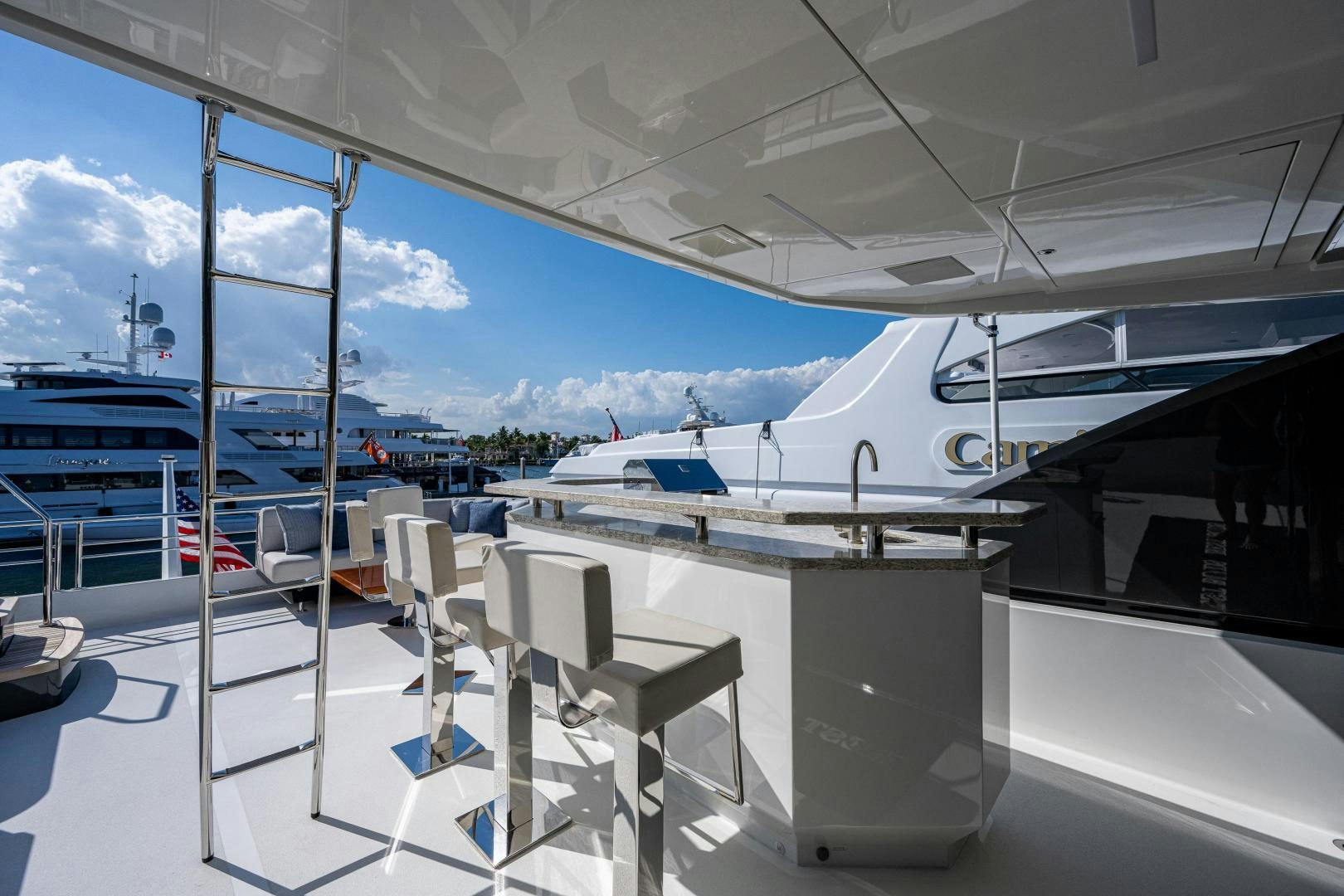a room with chairs and a table aboard SEAMENT Yacht for Sale
