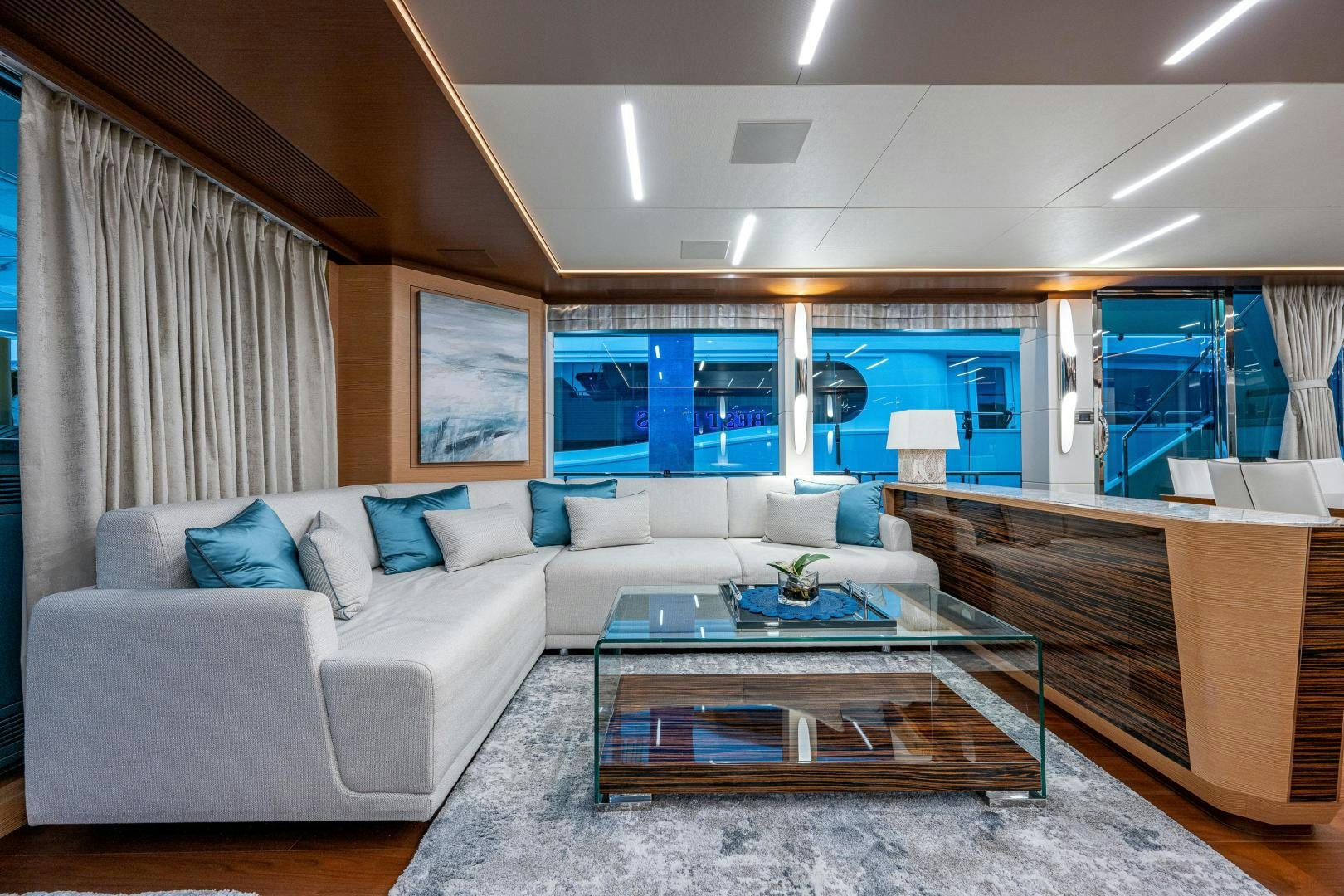 a living room with a large sofa aboard SEAMENT Yacht for Sale