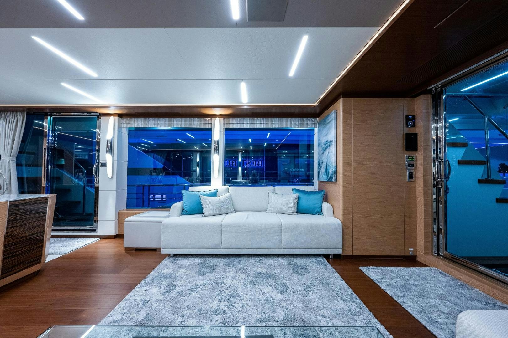 a living room with a large window aboard SEAMENT Yacht for Sale