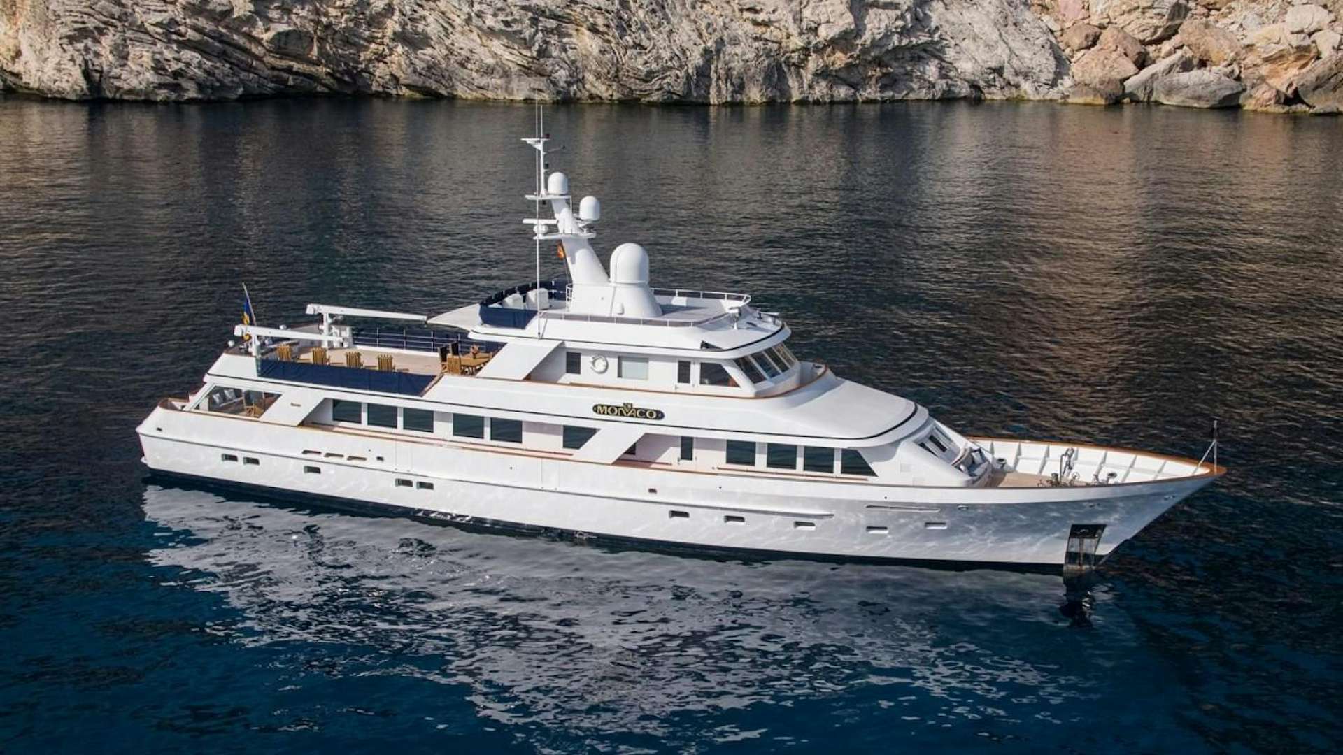 a white yacht in the water aboard MONACO Yacht for Sale