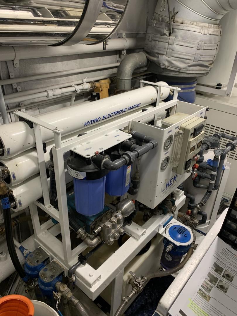 a machine with blue and white containers aboard MONACO Yacht for Sale