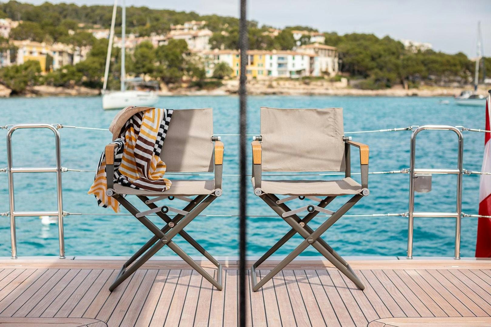 chairs on a deck aboard CIN CIN Yacht for Sale