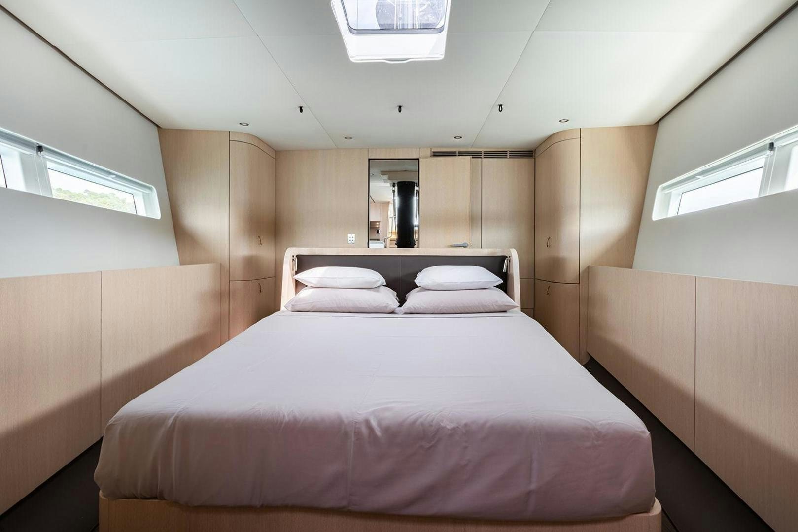 a bed in a room aboard CIN CIN Yacht for Sale