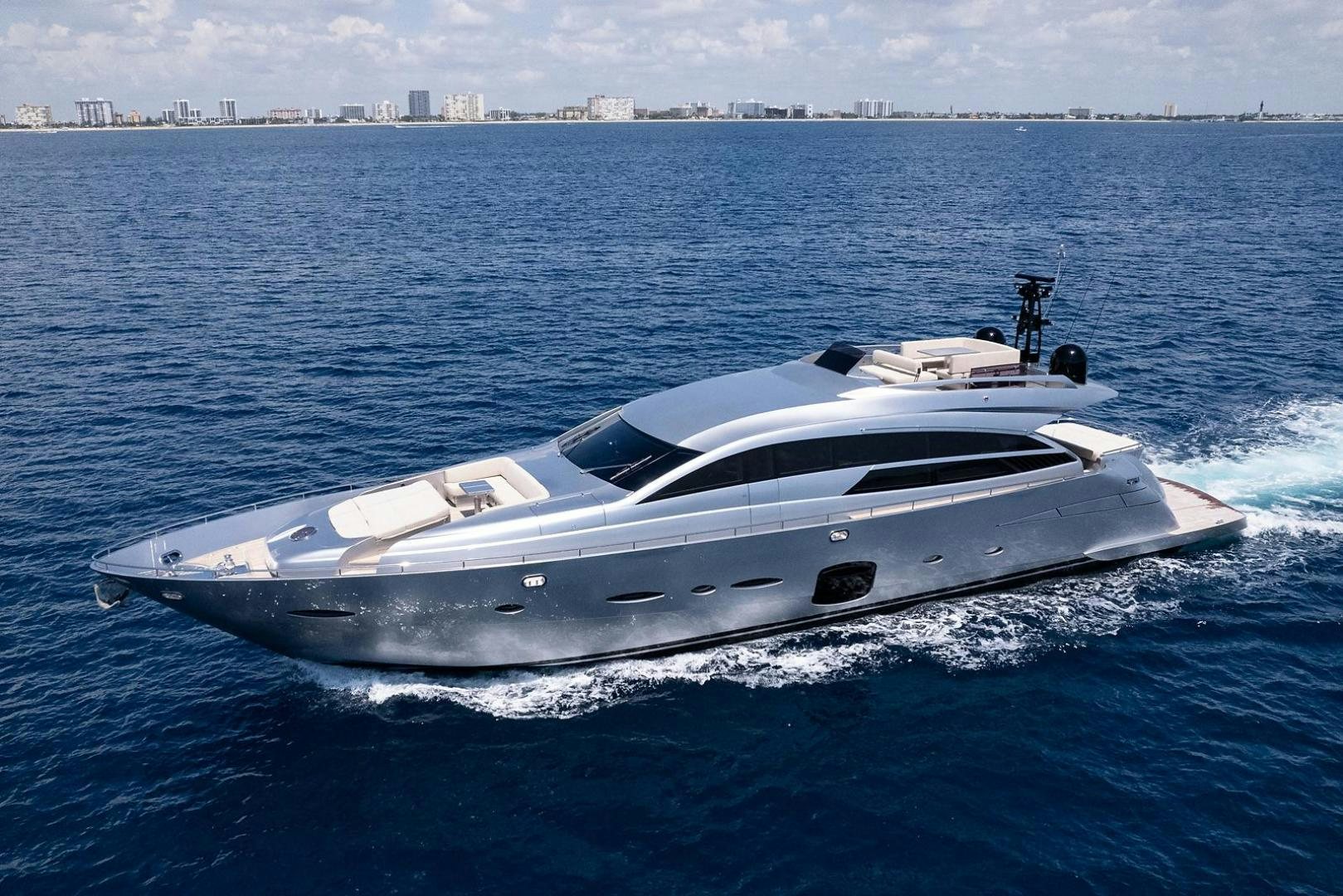 a white yacht in the water aboard IMAGINE Yacht for Sale