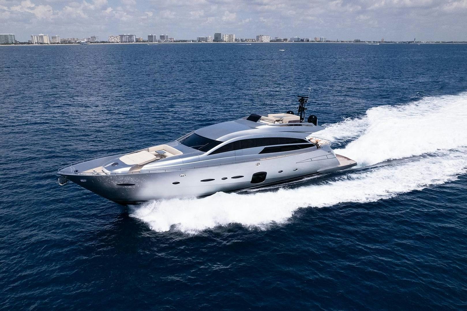 a white yacht on the water aboard IMAGINE Yacht for Sale