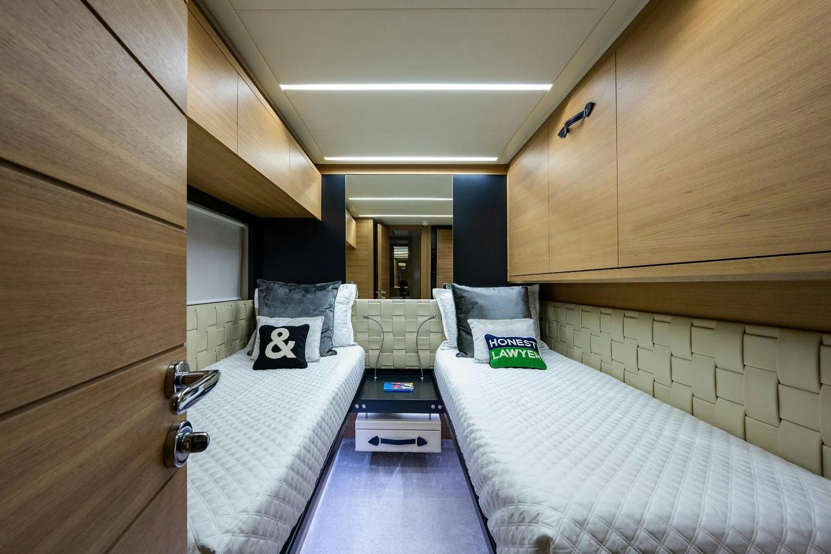 a room with two beds aboard IMAGINE Yacht for Sale