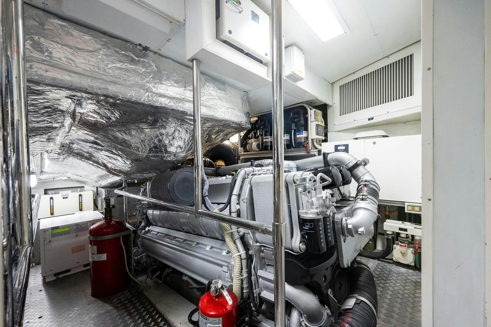 a large machine in a room aboard IMAGINE Yacht for Sale