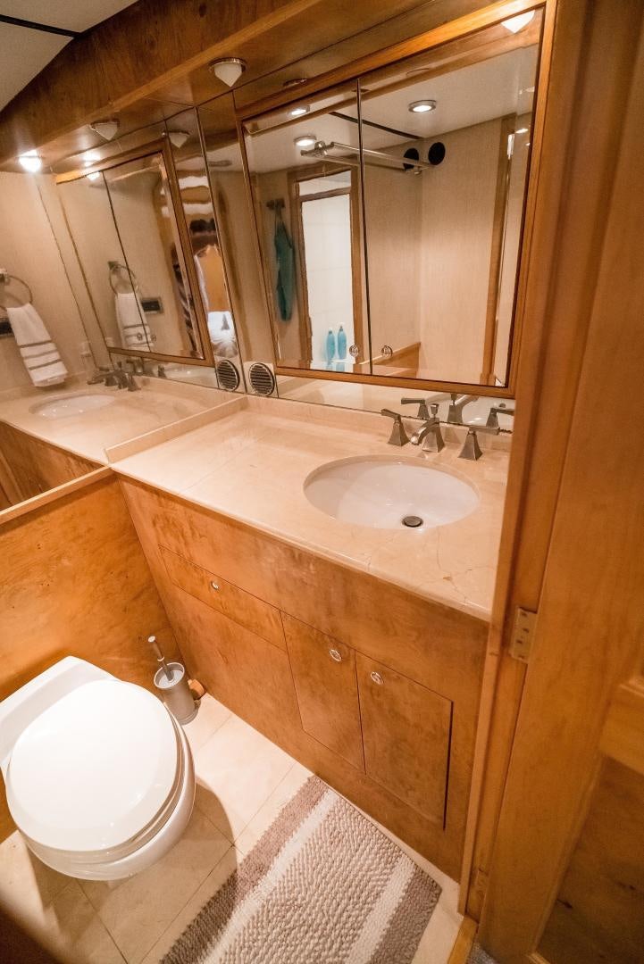 a bathroom with a sink and a toilet aboard CAPITAN MORGAN  Yacht for Sale