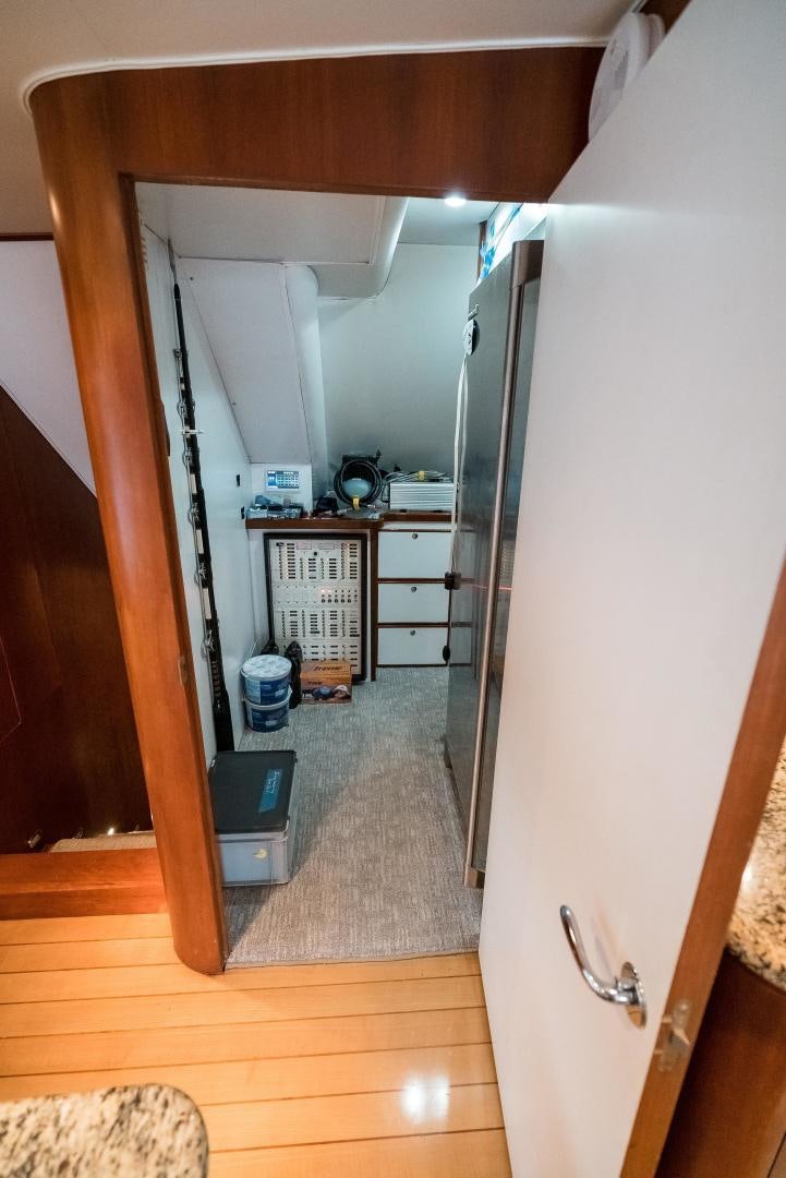 a kitchen with a fridge aboard CAPITAN MORGAN  Yacht for Sale