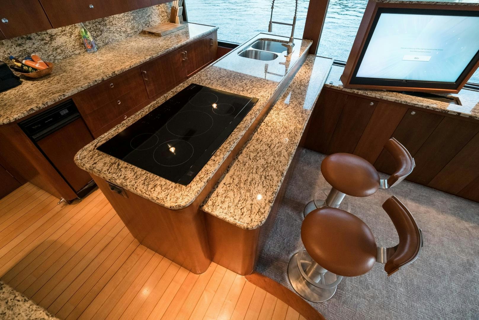 a kitchen with a wood stove aboard CAPITAN MORGAN  Yacht for Sale